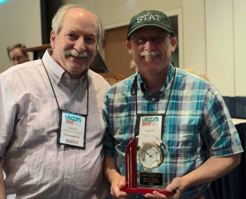 Dennis Pearl, Director of the CAUSE (left) presented Danny Kaplan (right) with the CAUSE/USCOTS Lifetime Achievement Award in Statistics Education