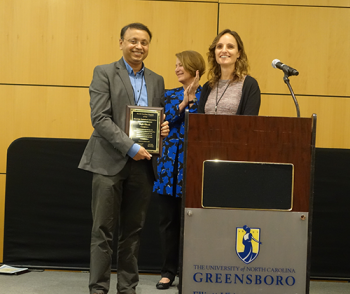 Sujit Ghosh (NC State) receiving distinguished NC-ASA service award. Sujit Ghosh (NC State) receiving distinguished NC-ASA service award.