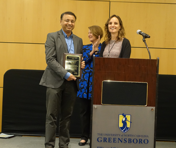 Sujit Ghosh (NC State) receiving distinguished NC-ASA service award.