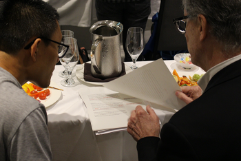 Leland Wilkinson and his mentee reviewing a manuscript. Leland Wilkinson and his mentee reviewing a manuscript.