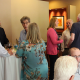 Forum participants continue conversation at reception